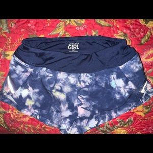 Athleta girl shorts, size XS/6, great condition, navy blue with pastel colors